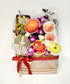Deluxe Fruit Hamper with Golden Gift Basket & Flowers Decor